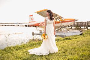 Orlando wedding photographer captures yellow and teal wedding at Tavares Pavilion on the lake