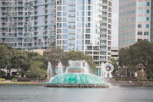 Surprise proposal at Lake Eola followed by an engagement photography session by top Orlando wedding photographer