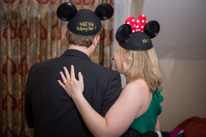 Surprise proposal during fireworks at Disney's grand floridian resort by best orando wedding photographer