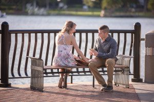 Surprise marriage proposal at Lake Eola in Downtown Orlando by top wedding photographer