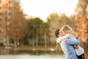 Surprise proposal and engagement at Lake Eola in downtown by top Orlando wedding photographer