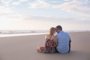 Surprise proposal and engagement at sunrise at New Smryna beach by top Orlando wedding photographer