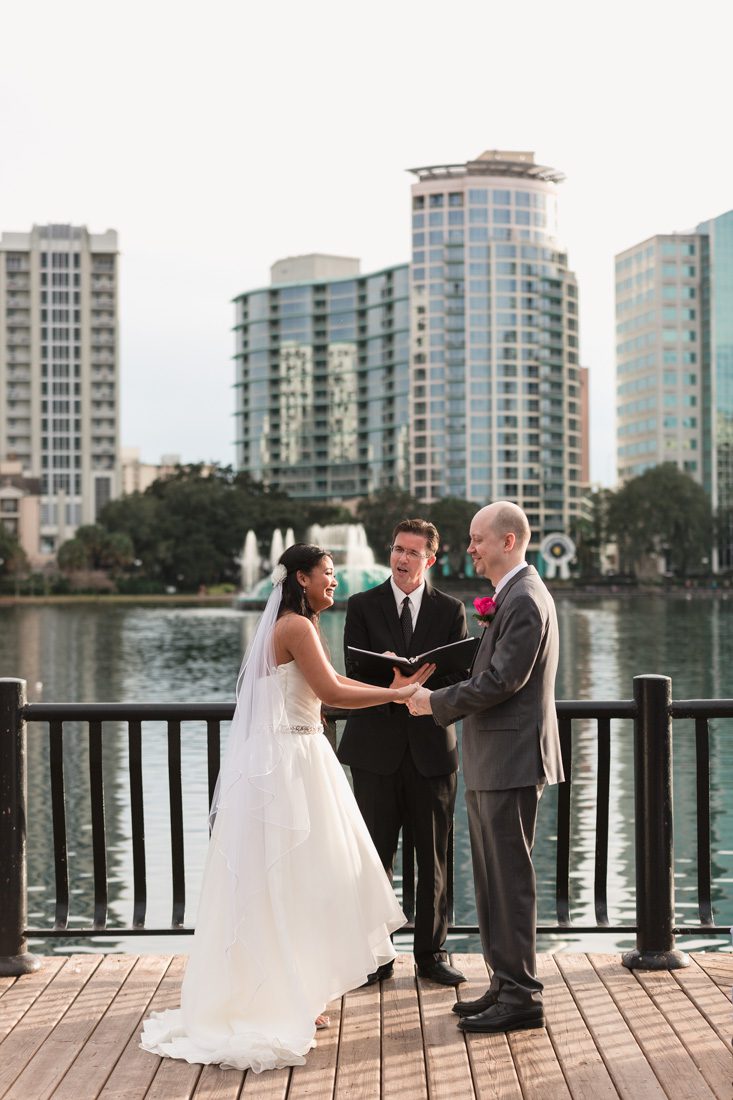 Top Orlando wedding photographer captures intimate elopement wedding ceremony at Lake Eola in downtown Orlando 