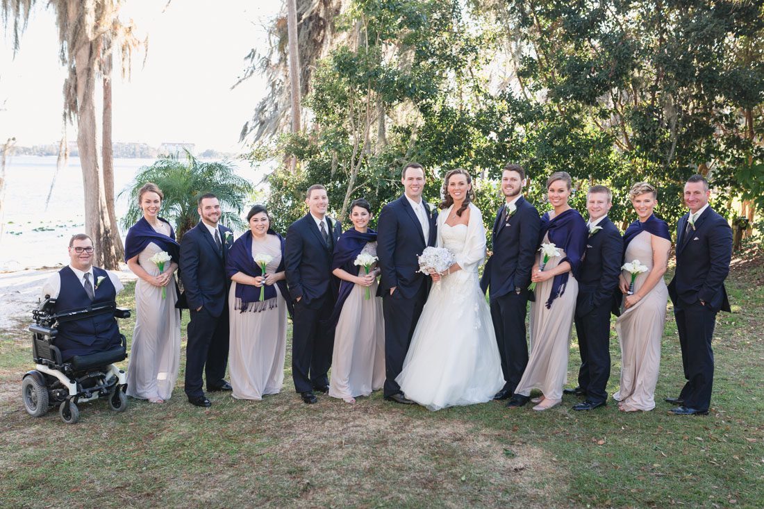 Top Orlando wedding photographer captures beachy outdoor wedding on the lake at Paradise Cove 