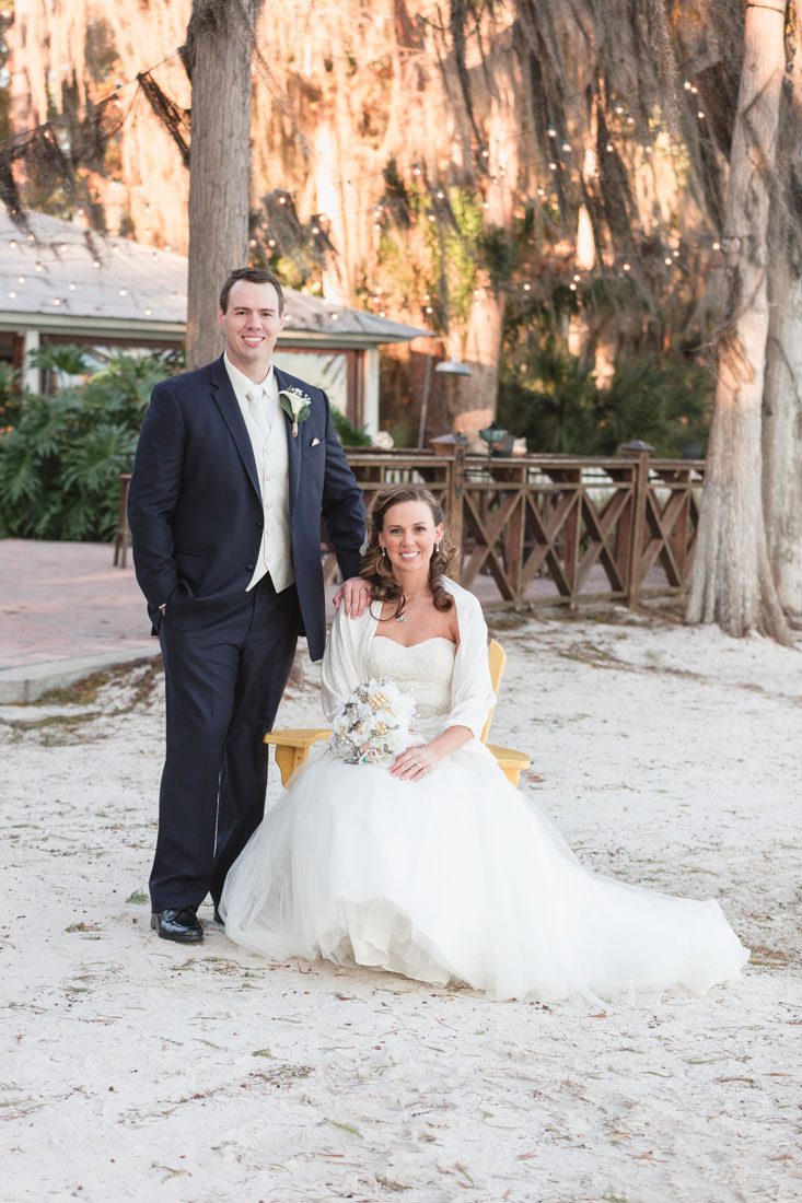 Top Orlando wedding photographer captures beachy outdoor wedding on the lake at Paradise Cove 