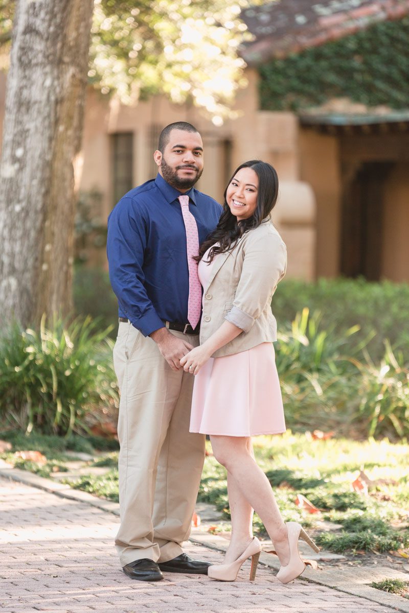 Orlando wedding photographer captures fun Spring engagement session at Rollins College in Winter Park featuring bunny heads