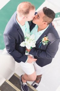 Orlando wedding photographer captures gay wedding in yacht dinner cruise boat