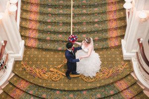 Orlando wedding photographer captures Beauty and the Beast themed Disney wedding at the pavilion and grand floridian