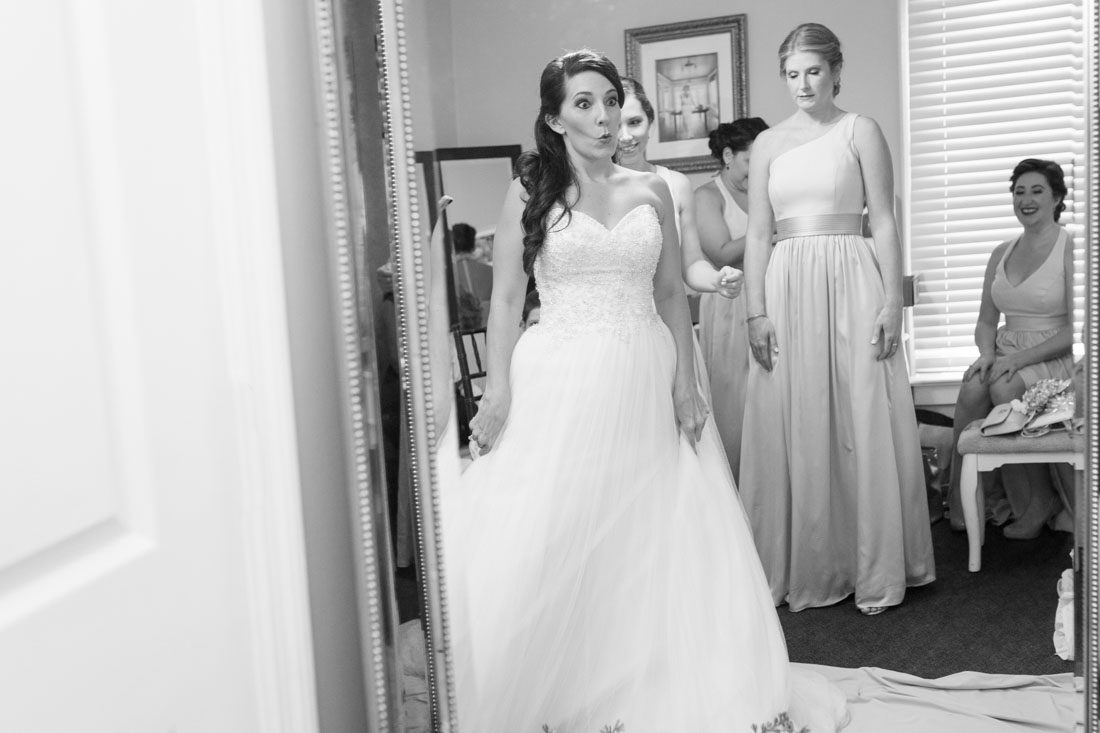 Orlando wedding photography and videography team capture bride getting ready for Veranda at Thornton park wedding in downtown