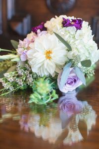 Purple themed wedding at the Tavares Pavilion on the Lake captured by top Orlando wedding photographer and videographer