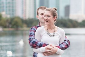 Sweet park engagement session at iconic Lake Eola park in downtown Orlando by top wedding and engagement photographer
