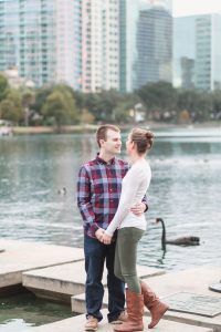 Sweet park engagement session at iconic Lake Eola park in downtown Orlando by top wedding and engagement photographer