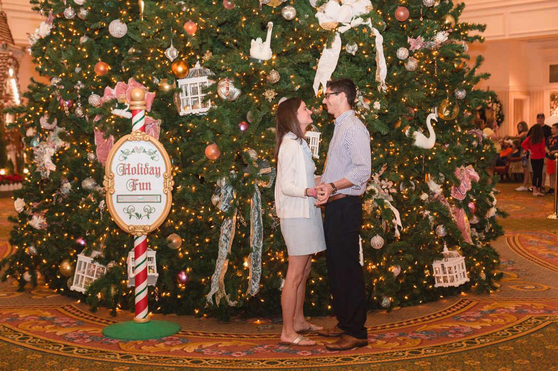 Surprise proposal at Disney's grand floridian resort by top Orlando engagement and wedding photographer