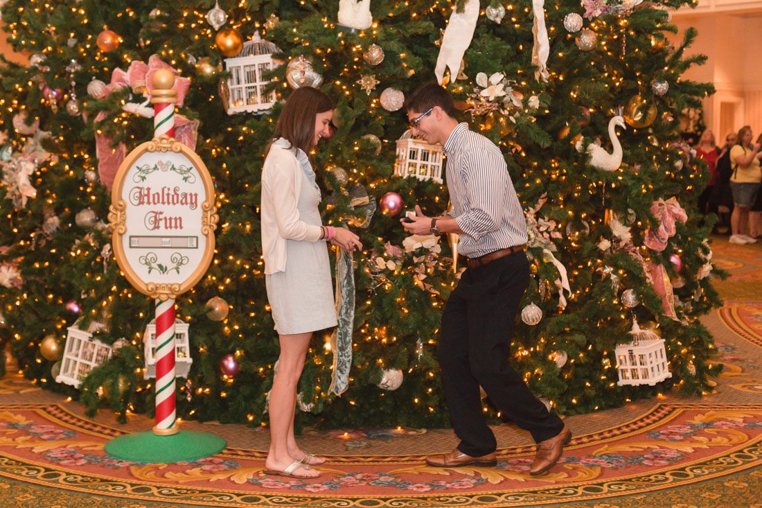 Surprise proposal at Disney's grand floridian resort by top Orlando engagement and wedding photographer