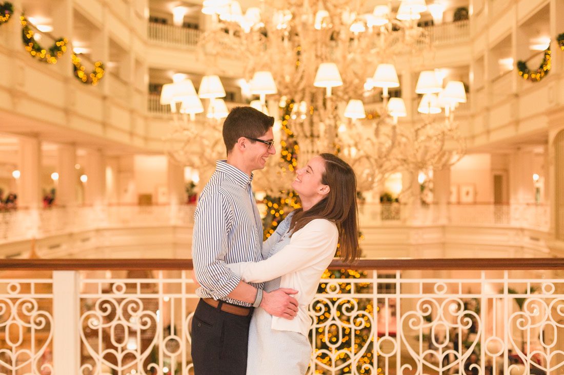 Photography of a surprise marriage proposal at Disney's Grand Floridian resort in Orlando by top engagement and wedding photographer