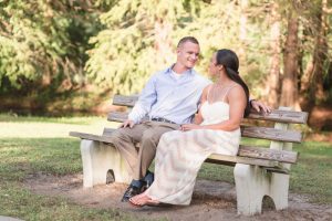 Sunny Fall engagement photography session in downtown Orlando park featuring their dogs