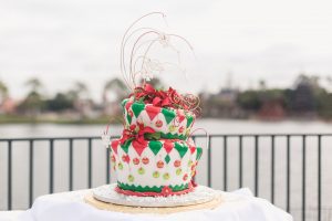 Close up of Christmas themed wedding cake for Epcot wedding reception at Disney by Orlando wedding photographer