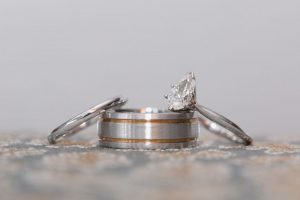 Close up for the wedding rings and bands for Disney wedding by top Orlando photographer