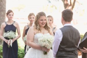 Lesbian couple exchanges vows at the Disney swan and dolphin resort captured by top Orlando wedding photographer
