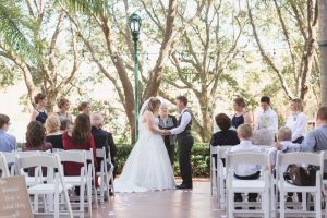 Lesbian couple exchanges vows at the Disney swan and dolphin resort captured by top Orlando wedding photographer