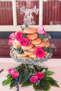 Donut wedding cake for Disney wedding at the House of Blues by top Orlando wedding photographer