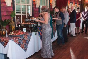 Lesbian couple enjoying their brunch reception at Disney house of blues captured by top Orlando wedding photographer and videographer