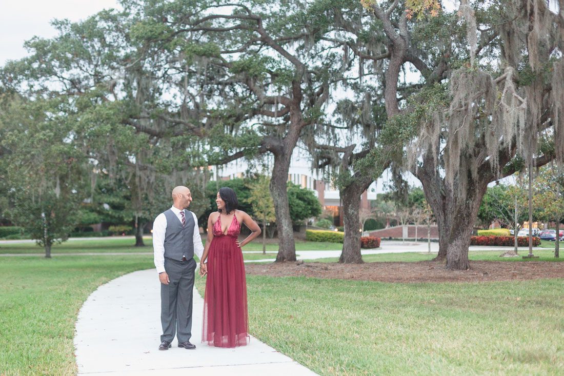 Romantic and fashion forward engagement session with a stylish couple at the university of central florida ucf in orlando with top wedding photographer