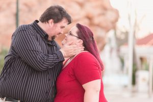 Couple celebrates their wedding anniversary with engagement style portrait photography at Disney's grand floridian resort in Orlando