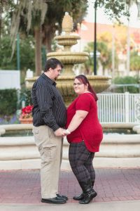Couple celebrates their wedding anniversary with engagement style portrait photography at Disney's grand floridian resort in Orlando