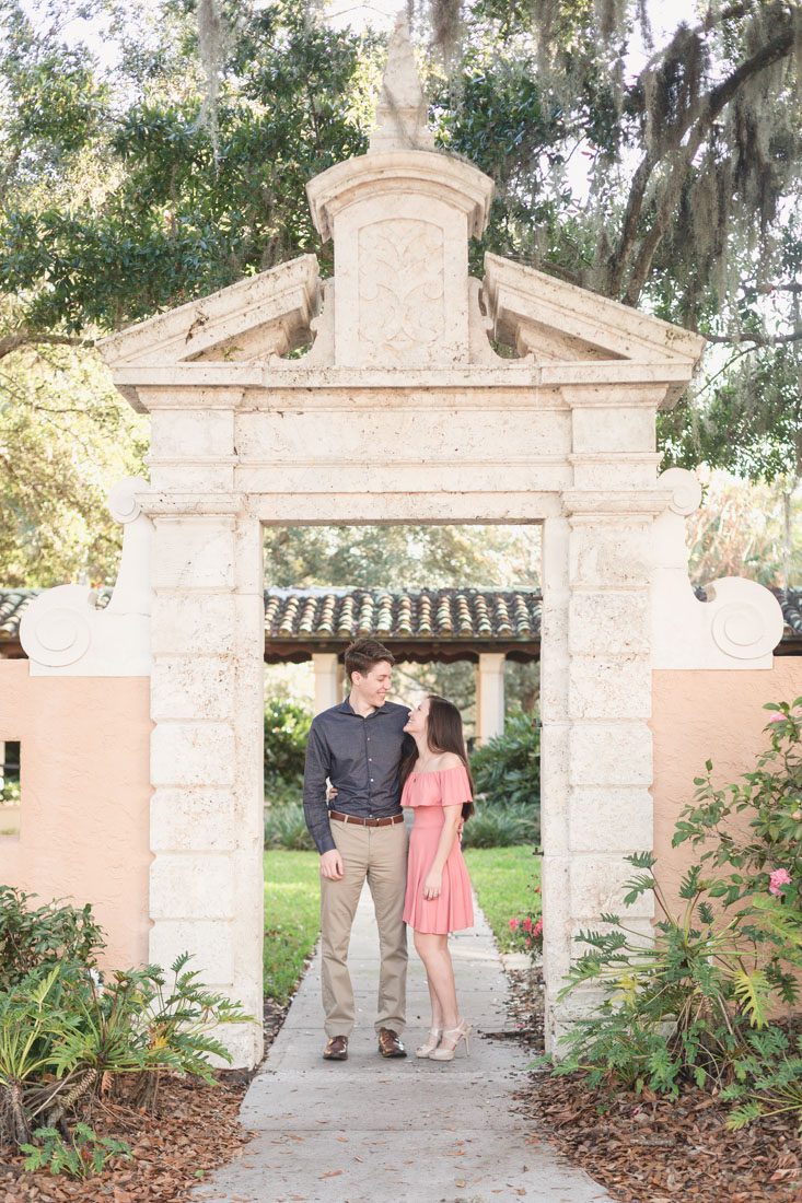 Orlando wedding photographer captures romantic and playful engagement photography session at Rollins college in Winter Park