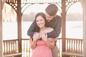 Orlando wedding photographer captures romantic and playful engagement photography session at Rollins college in Winter Park with the couples cat and dog