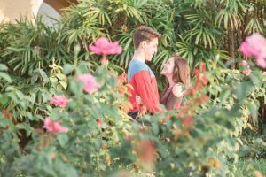 Orlando wedding photographer captures engagement session in a rose garden at Rollins college campus in Winter Park Florida