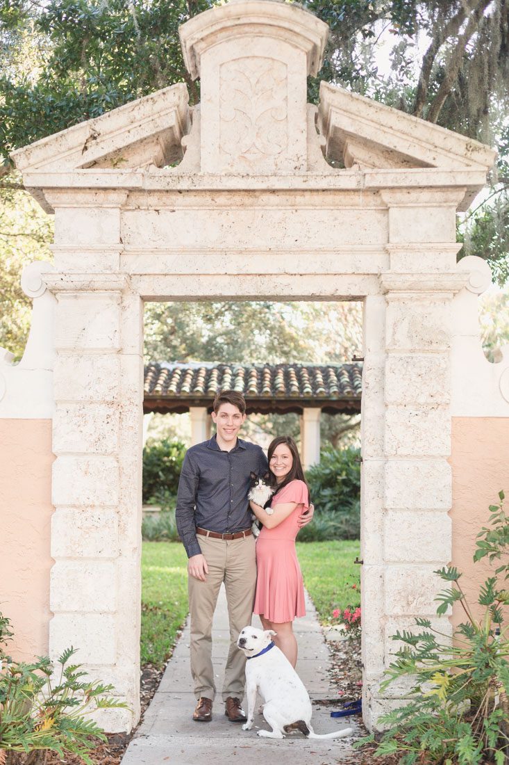 Orlando wedding photographer captures romantic and playful engagement photography session at Rollins college in Winter Park