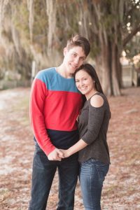 Orlando wedding photographer captures romantic and playful engagement photography session at Rollins college in Winter Park with the couples cat and dog