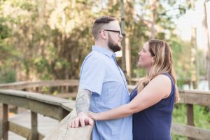 Engaged couple at their photo session captured by top Orlando wedding photographer at a Disney resort