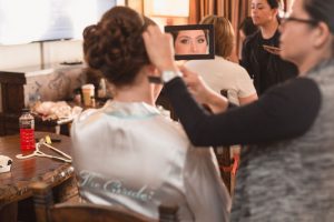 Disney bride getting ready at the Fort Wilderness resort for her wedding day