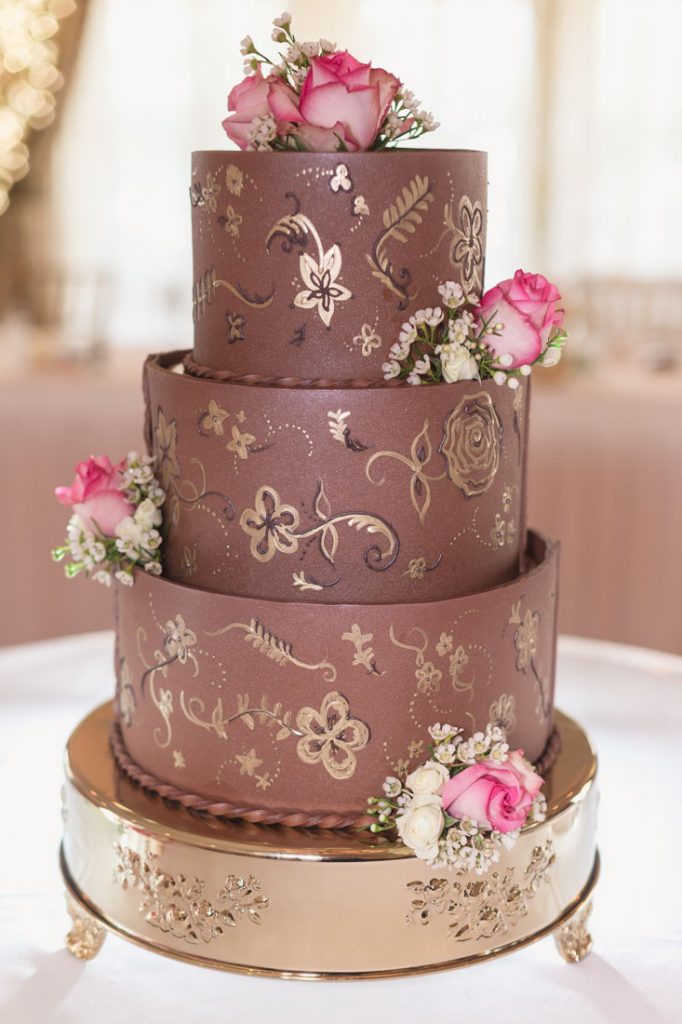 Hand painted chocolate wedding cake at Disney wedding at Grand Floridian