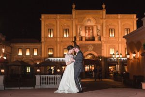 Disney wedding couple poses in Italy at Epcot during their dessert party