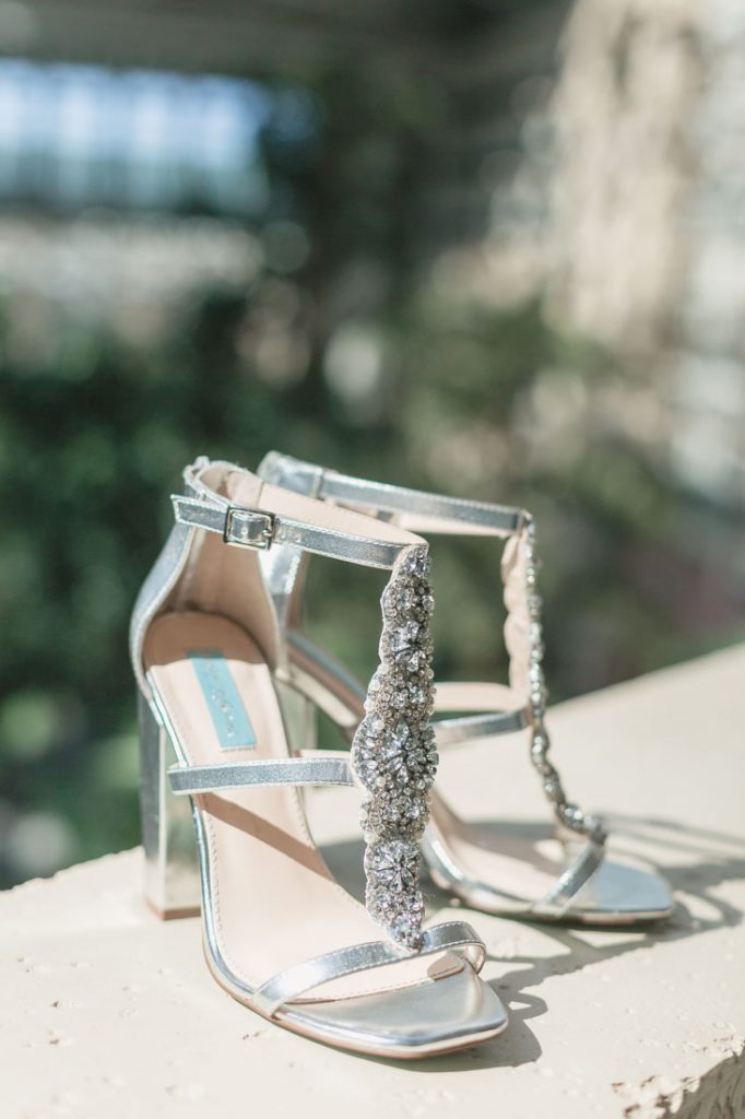 Close up of the brides Betsey Johnson wedding shoes by Orlando photographer