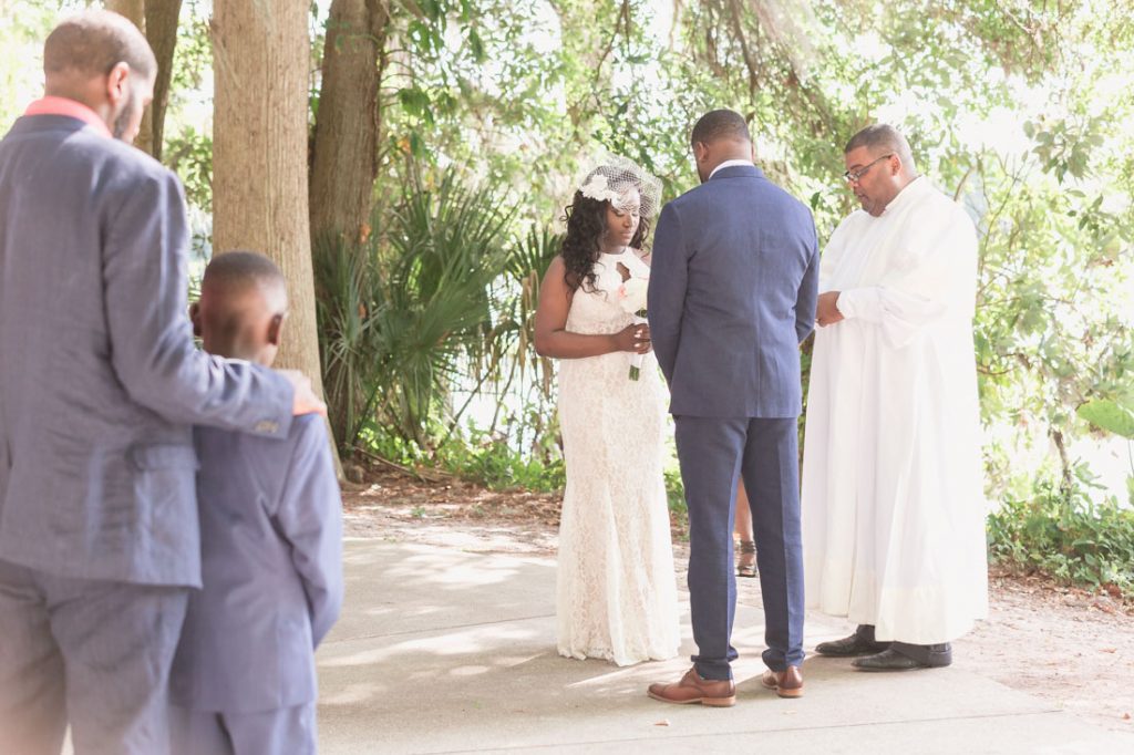 Couple exchange vows at Kraft Azalea gardens elopment captured by Orlando wedding photographer