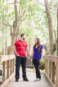 Engagement photography session in Winter Park on a bride by the water
