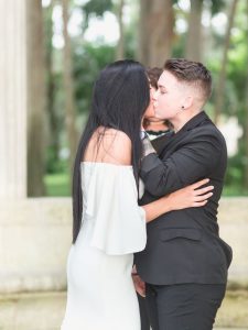 The brides share their first kiss at their intimate elopement at Kraft Azalea