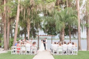 Orlando wedding photographer and videographer captures a wide shot of the ceremony at Paradise Cove wedding