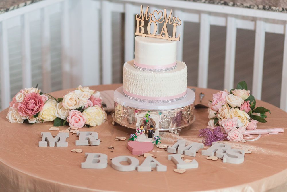 Wedding cake table at Paradise Cove Orlando captured by wedding photographer and videographer