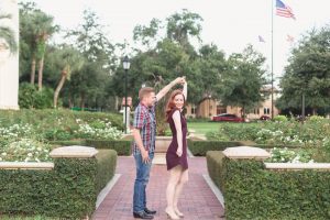 Fun twirl during this romantic engagement portrait session at Rollins College in Winter Park with top engagement and wedding photographer in Orlando