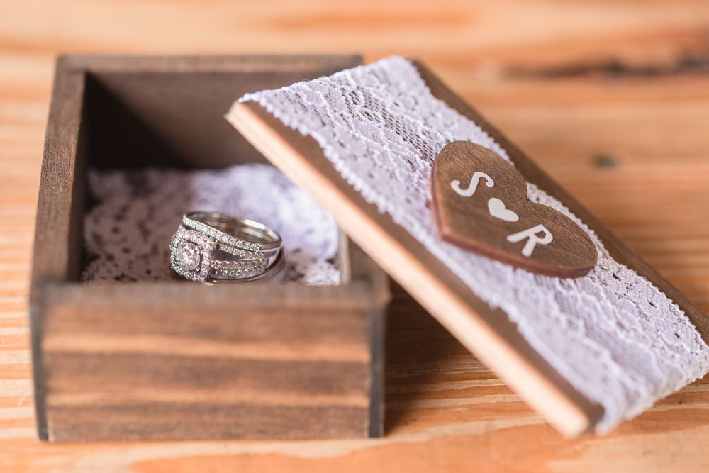 Close up of the wedding rings for a country wedding captured by top Orlando wedding photographer