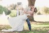 A knock out first kiss at a country wedding ceremony outdoors at a farm north of Orlando Florida
