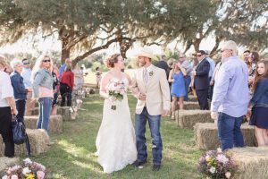 Chic country inspired wedding day at a red barn north of Orlando captured by top wedding photographer