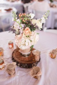 DIY charming country centerpieces at a barn wedding in Sumterville Florida