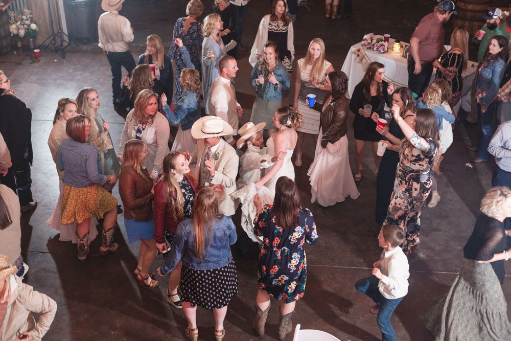 Photos of a fun country wedding reception at a barn north of Orlando Florida